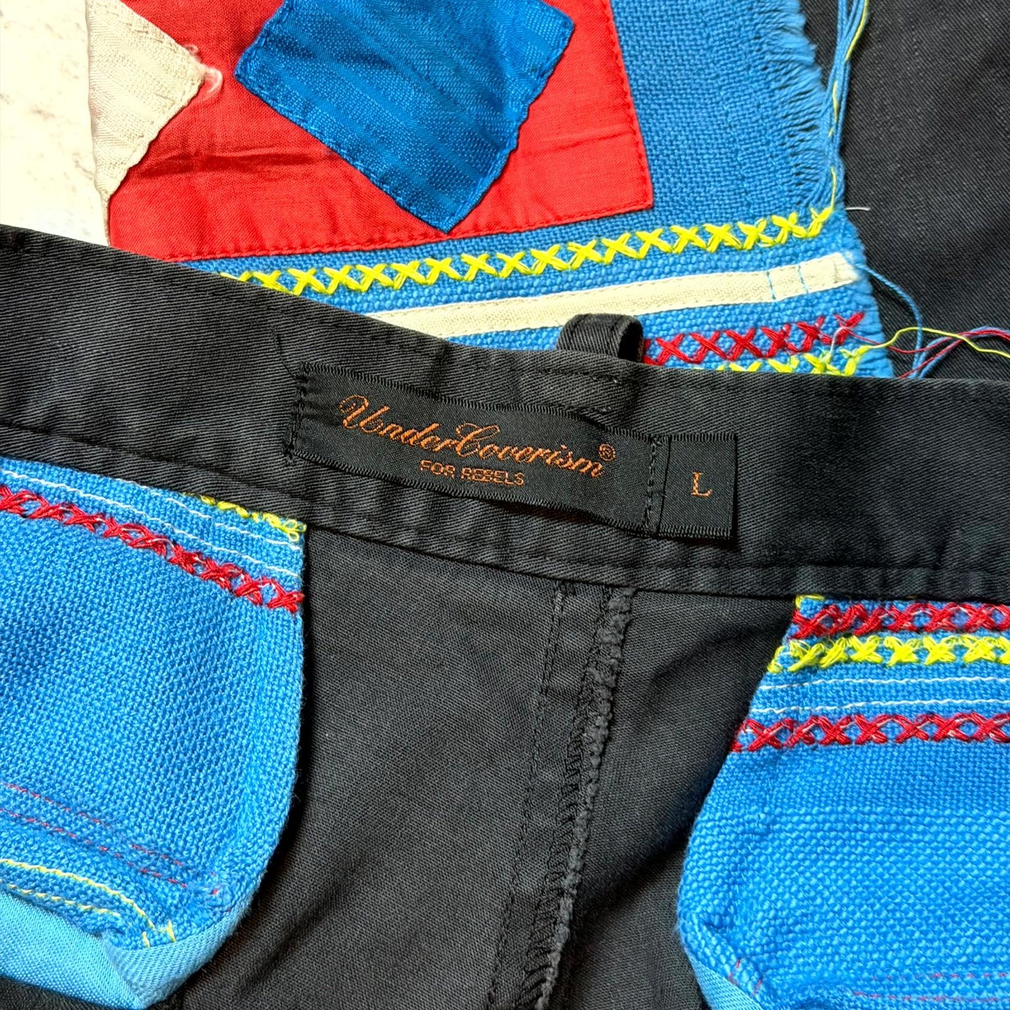 SS03 Undercover Ethnic Scab Pants