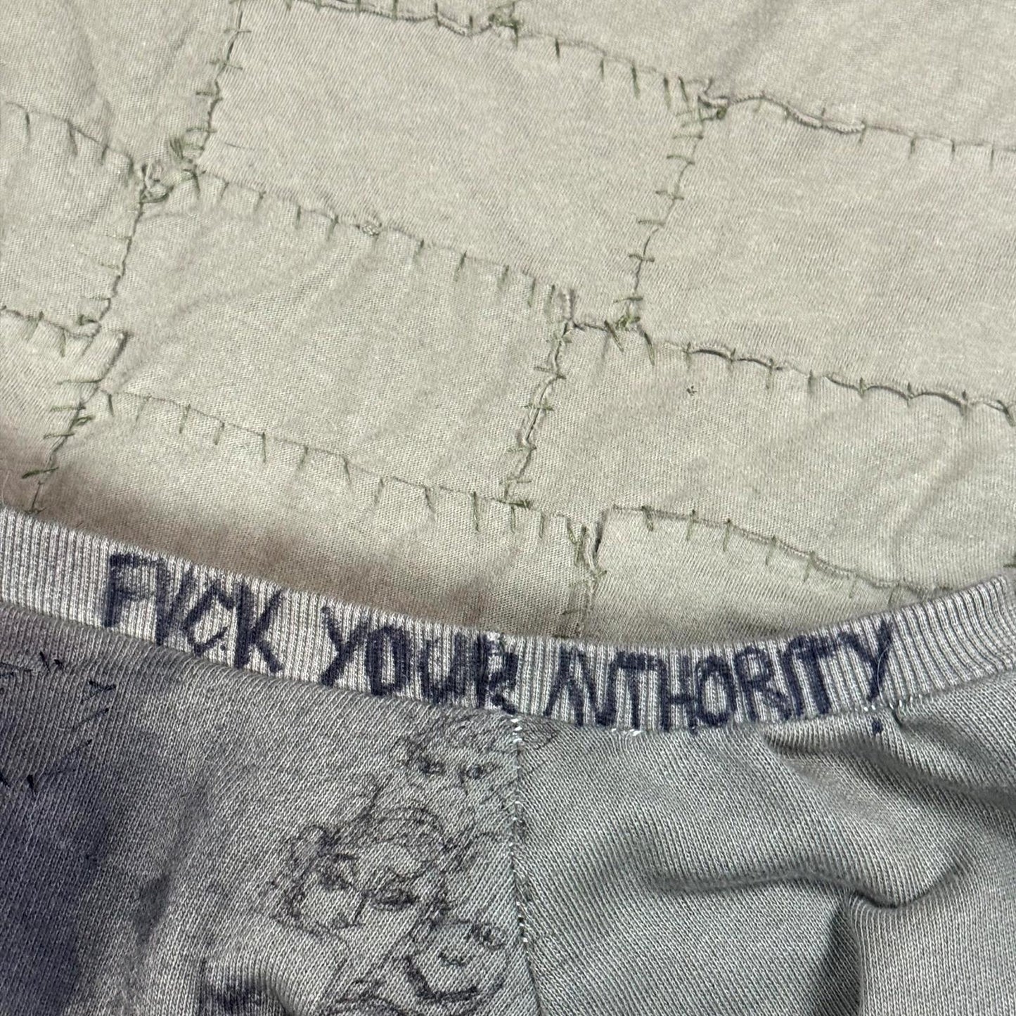 Miju Repairs ‘Faces’ Patchwork Crewneck