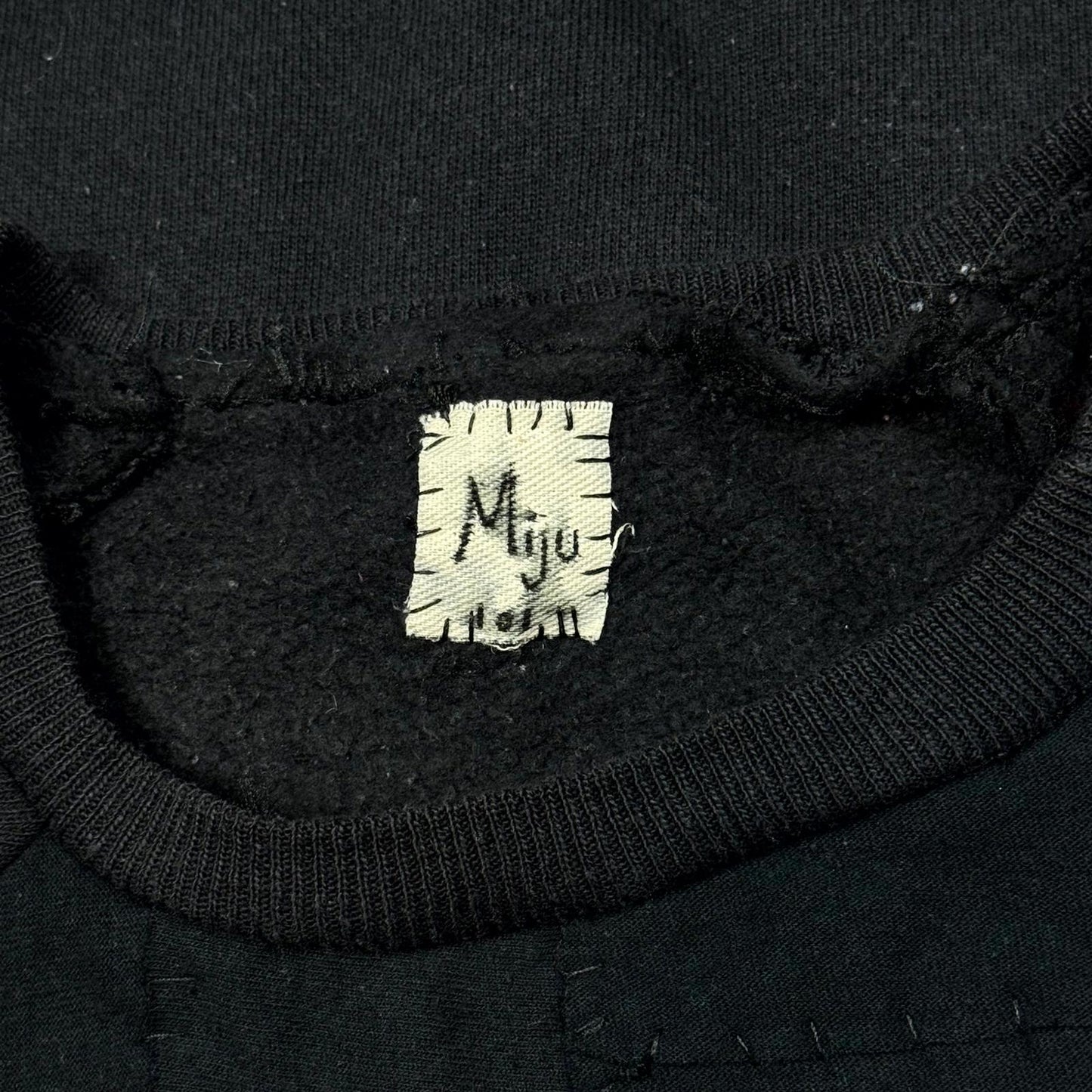Miju Repairs ‘I Don’t Dial 911’ Patchwork Crewneck
