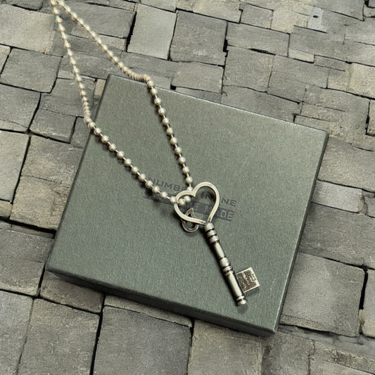 Number Nine Crying Heart “Key” Chain